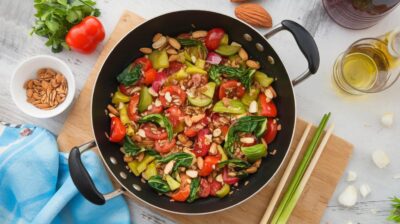 Découvrez comment ravir vos papilles avec un wok de légumes croquants aux amandes, idéal pour vos repas rapides et savoureux